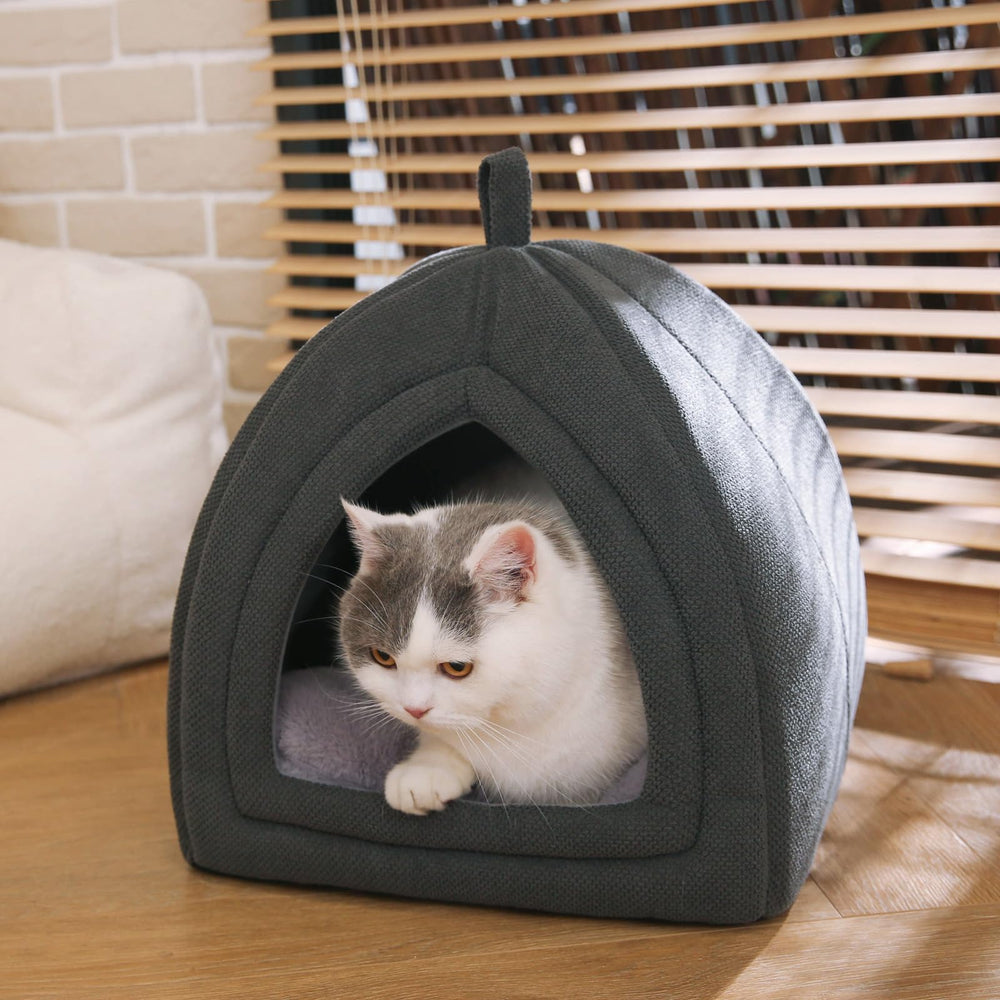 Amazon Basics Cat Cave Bed non-slip base helps prevent sliding on smooth floors.