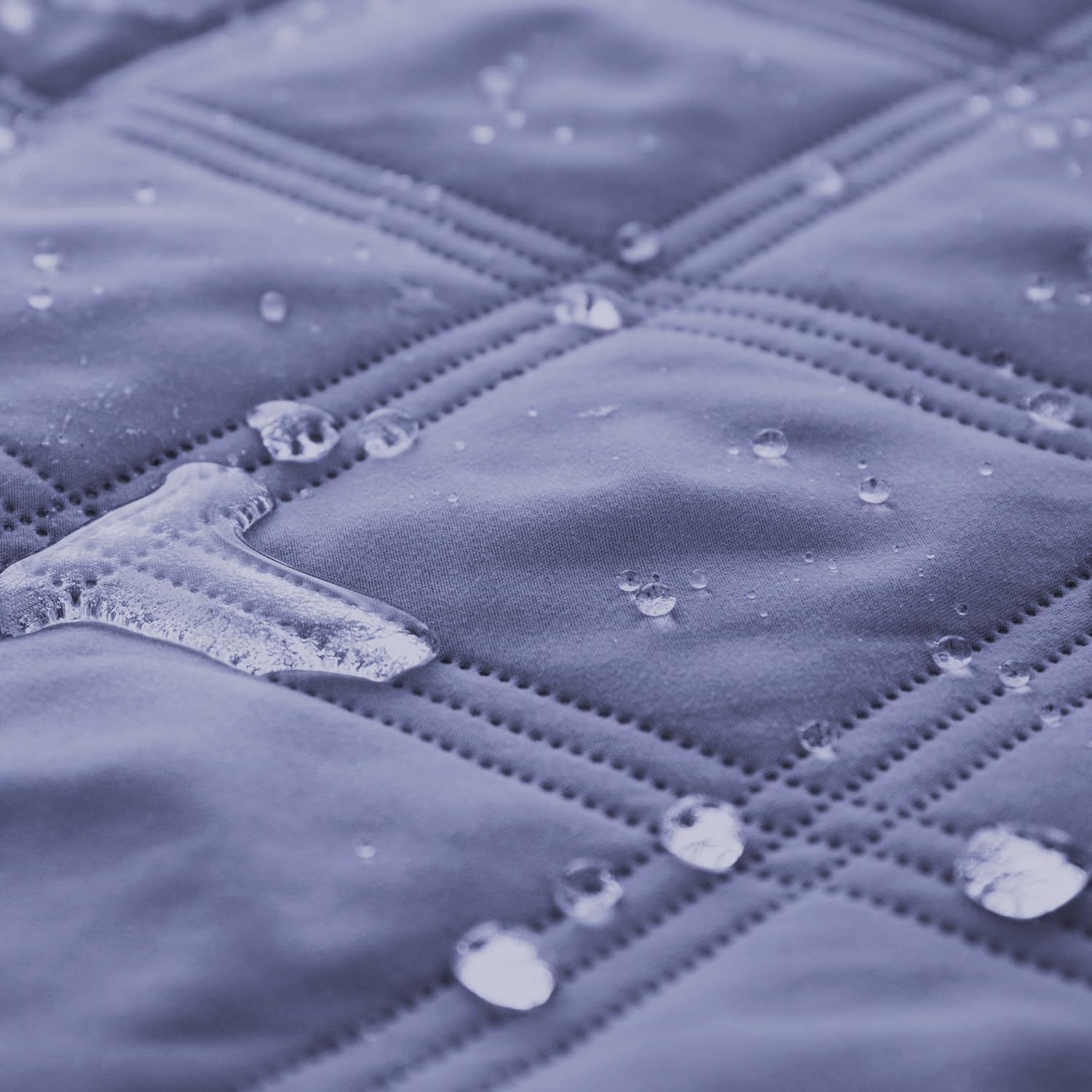 Ameritex waterproof bed cover closeup material highlights 5-layer design and odor control.