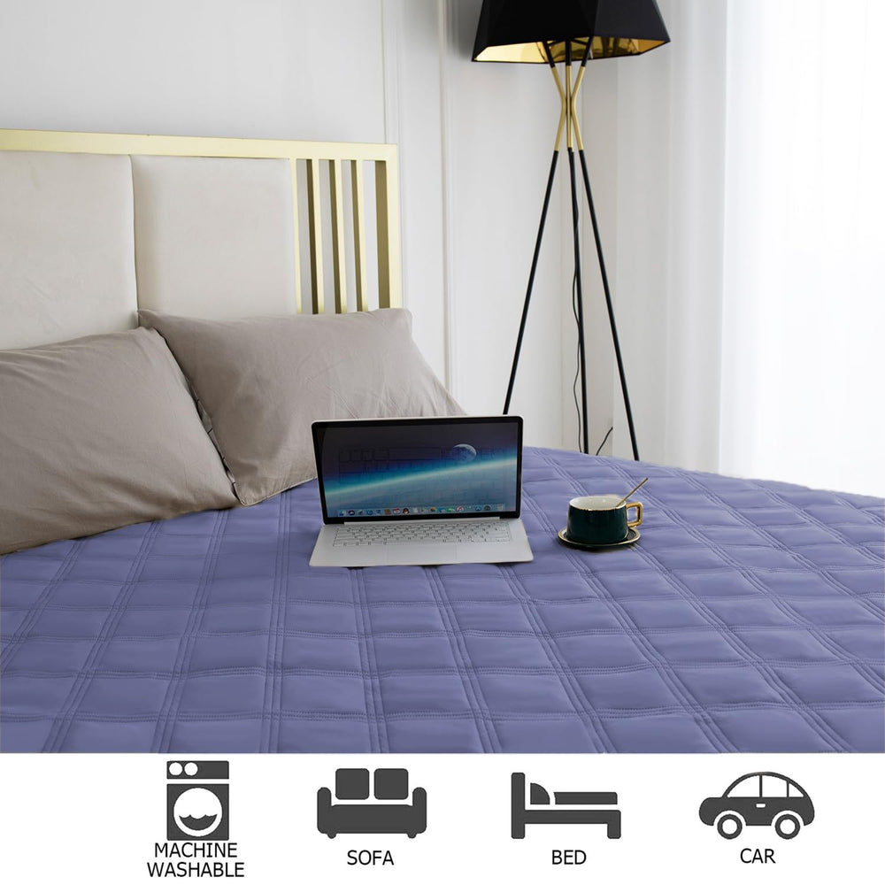 Ameritex waterproof bed cover in a living room setup emphasizes spill defense during playtime.