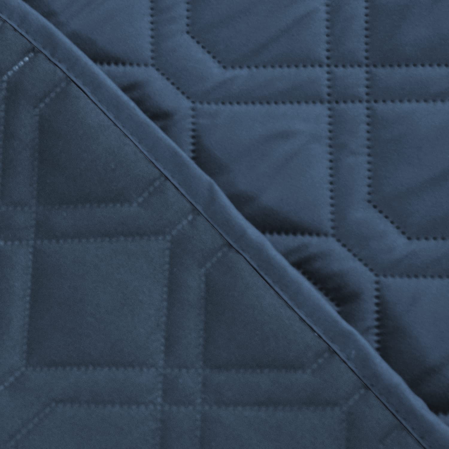 Ameritex blanket on floor demonstrates easy-clean surface after muddy paws.