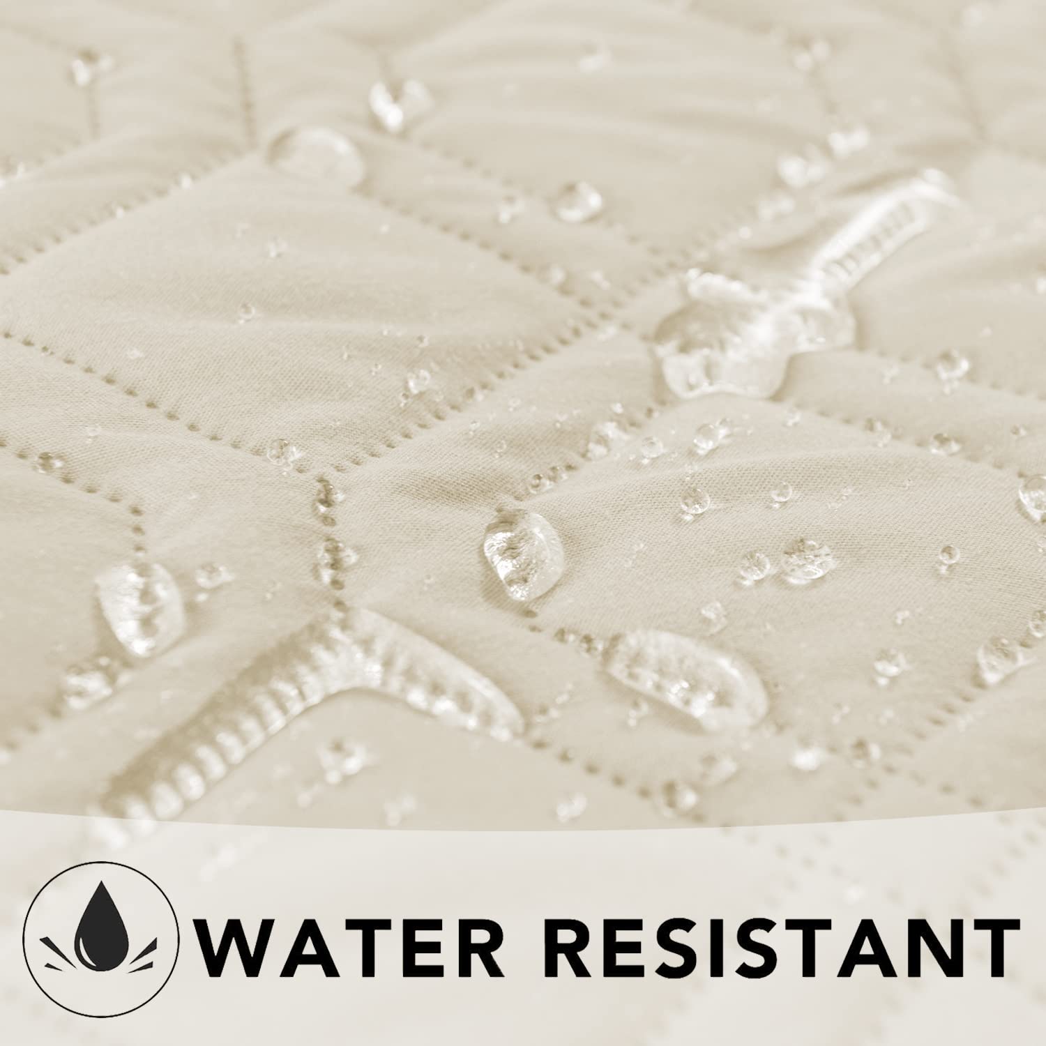 Ameritex waterproof blanket shown on a sofa, offering reversible two-tone styling