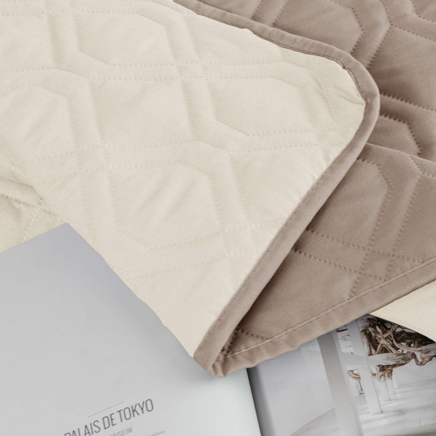 Ameritex waterproof dog bed cover on sofa guarding against accidents