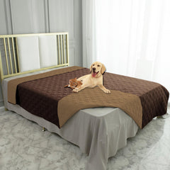 Ameritex waterproof dog bed cover on sofa protecting upholstery from spills.