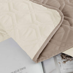 Ameritex waterproof dog bed cover on sofa guarding against accidents