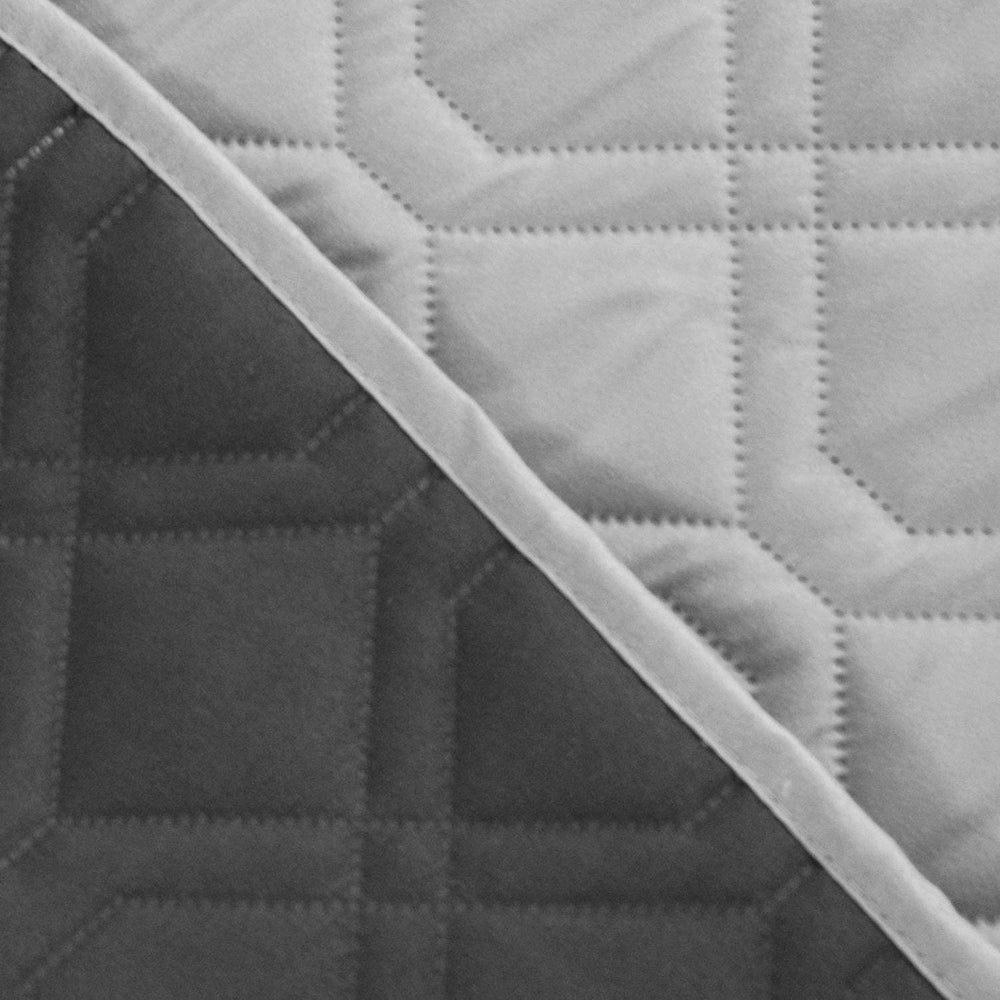 Ameritex waterproof dog bed cover with a pet resting, showcasing cozy protection.