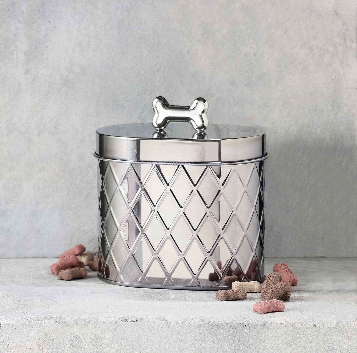 Amici Pet Chance oval metal canister showing the silver bone knob for easy lid access and style.