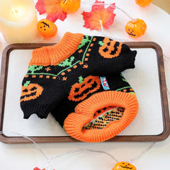 ANIAC pumpkin-costume knitwear provides lightweight warmth for fall strolls.