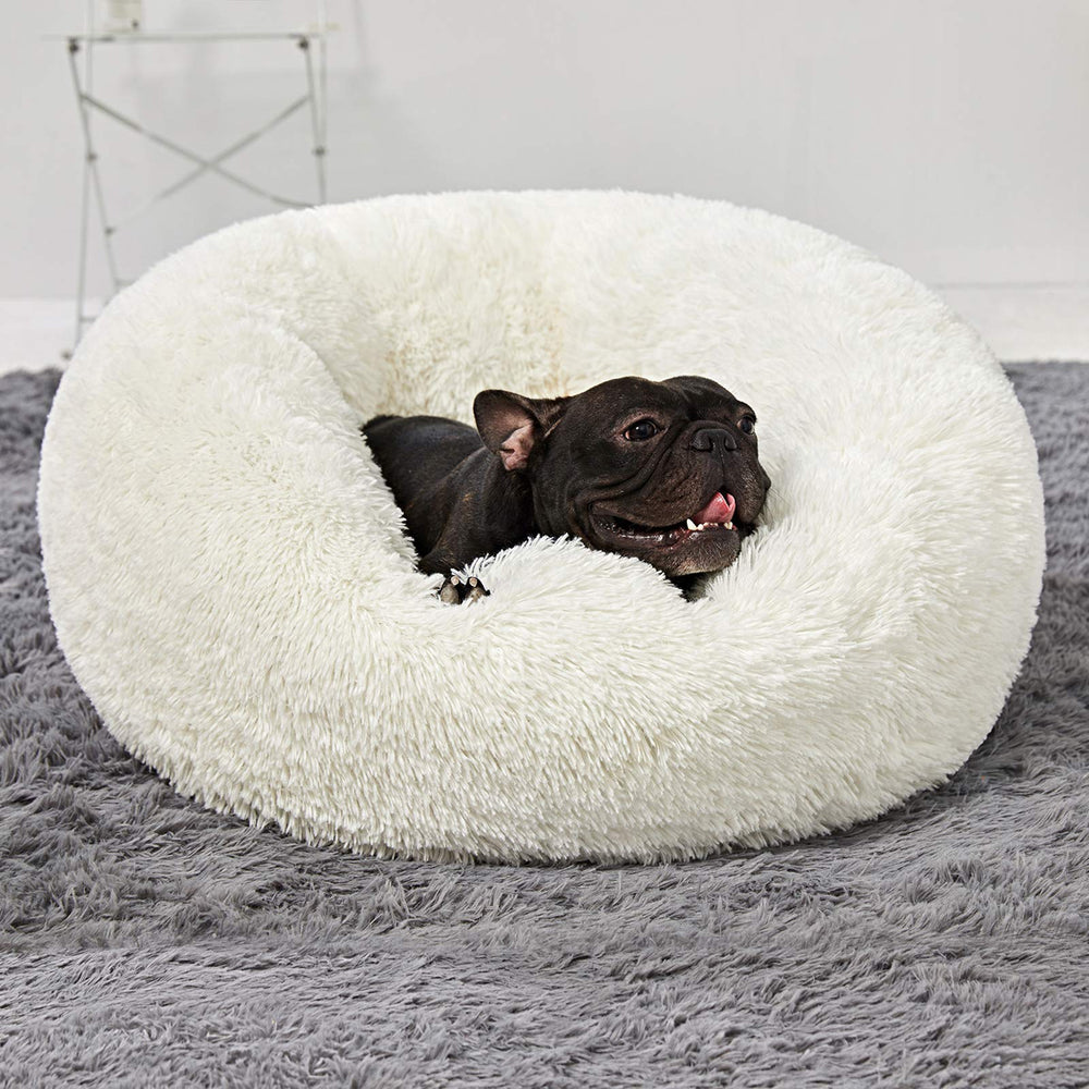 ANWA Small dogs fit this 24 inch round bed for cozy snuggling.