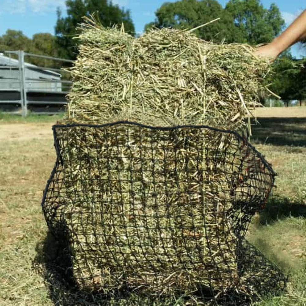 Aoneky Bale Hay Net loaded on a 36x18x18 bale demonstrating slow feeding setup.