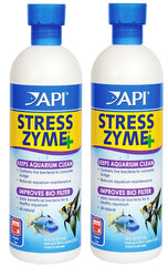 API Stress Zyme bottle pour demonstrates sludge-eating action for a cleaner aquarium.