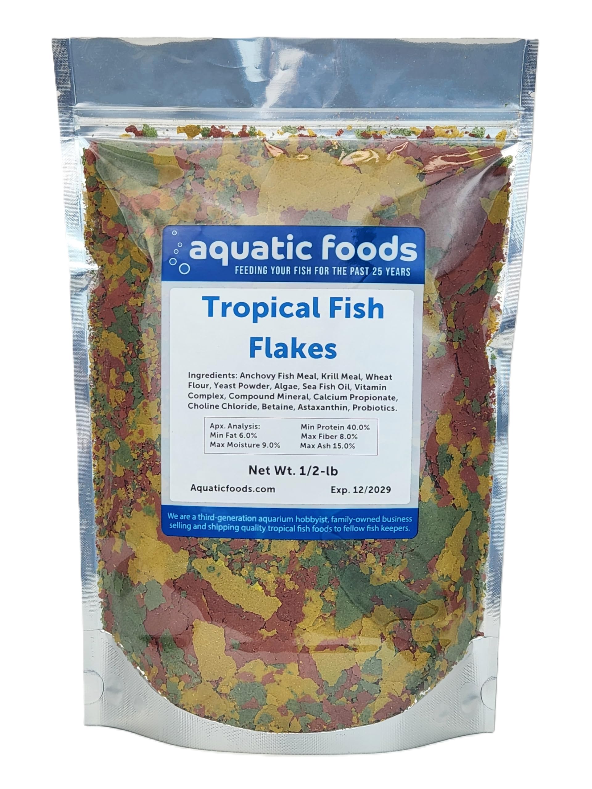 Aquatic Foods Inc Premium Community Flakes packaging highlights high-quality nutrition for diverse tropical fish.