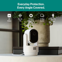 Arlo Essential 2K living room wide shot shows full room coverage.