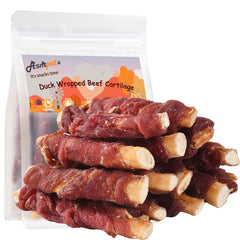 ASMPET dog treats bones with duck-wrapped visuals show protein-rich chew for dogs.