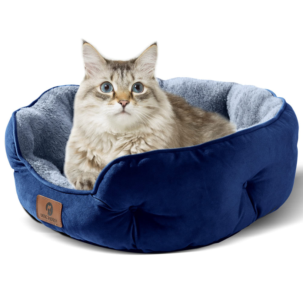 Asvin small dog bed blue side view showcases secure lounging and neck support.
