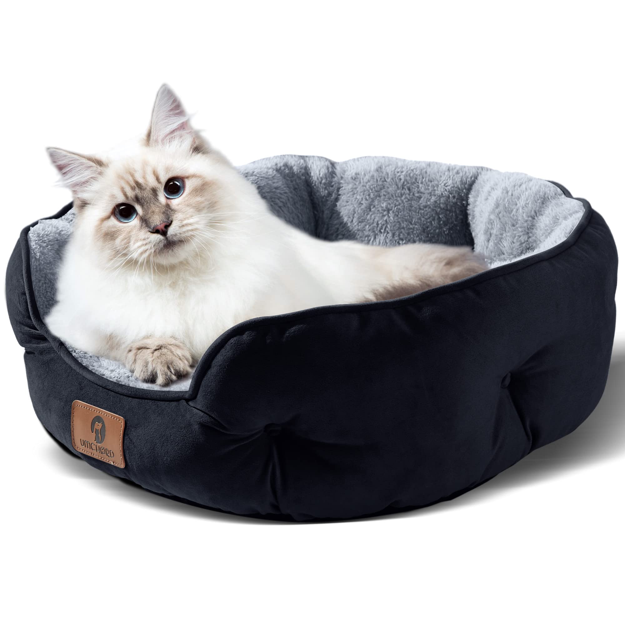 Asvin Small Dog Bed round design provides security and neck support for lounging.