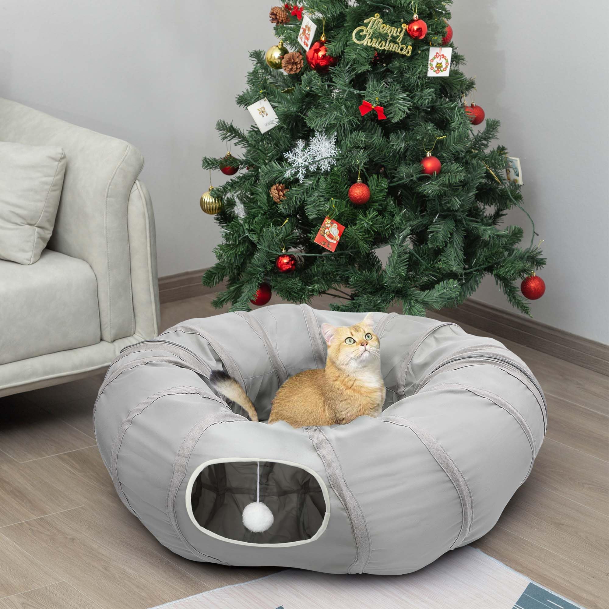 AUOON cat play tunnel under a Christmas tree for cozy play and decoration.