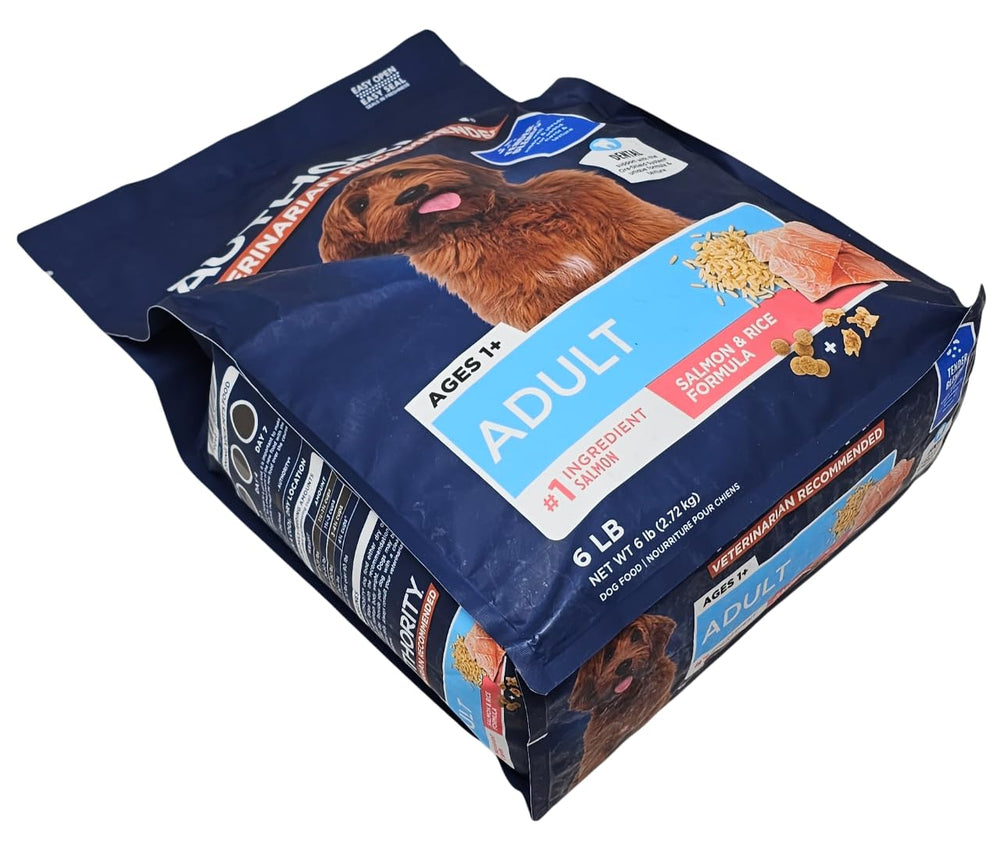 Authority adult dog enjoying meal with salmon and rice blend