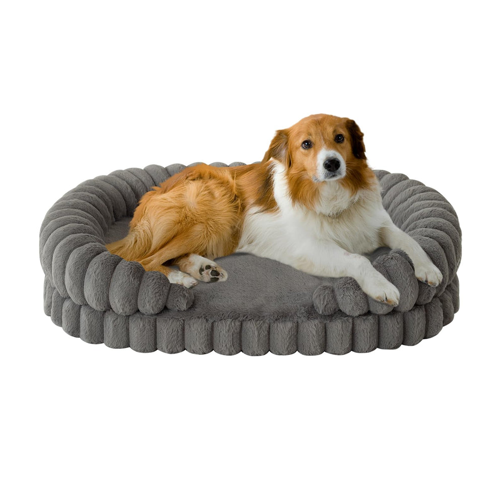 BALANCE calming dog bed 36-inch oval side view supports neck as dog curls up in comfort.