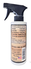 Banixx Pet Care Spray applied to a scratch for quick cleaning and soothing.