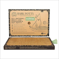 Bark Potty teething-puppy-use shows an indoor potty option aiding teething training