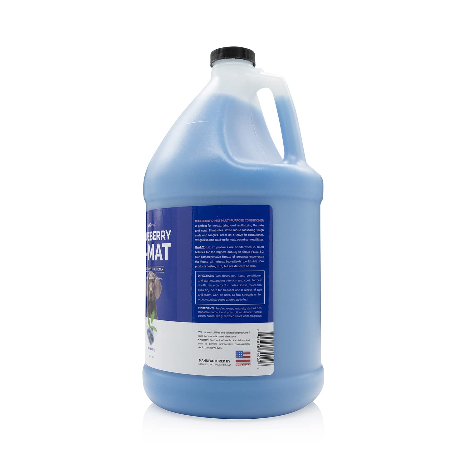 Bark2Basics Blueberry D-Mat Conditioner applied to dog coat during brushing.