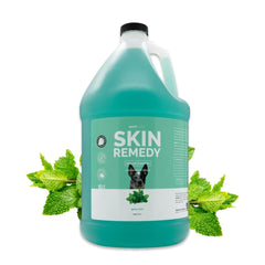 Bark2Basics Skin Remedy bottle closeup, 1-gallon size for easy at-home grooming.