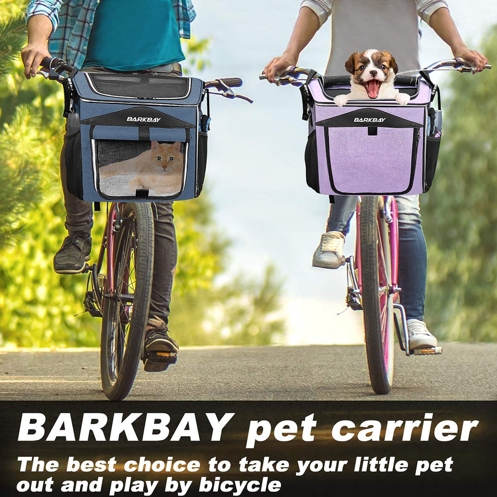 BARKBAY dog bike basket in use with a small dog enjoying the breeze.