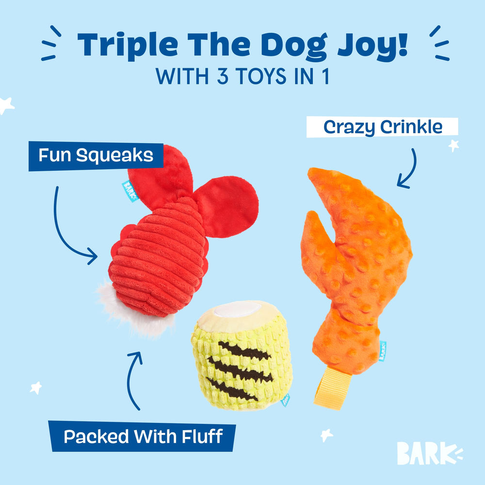 BarkBox The Maine Event lobster-claw toy close-up showing durable plush for thrashing.