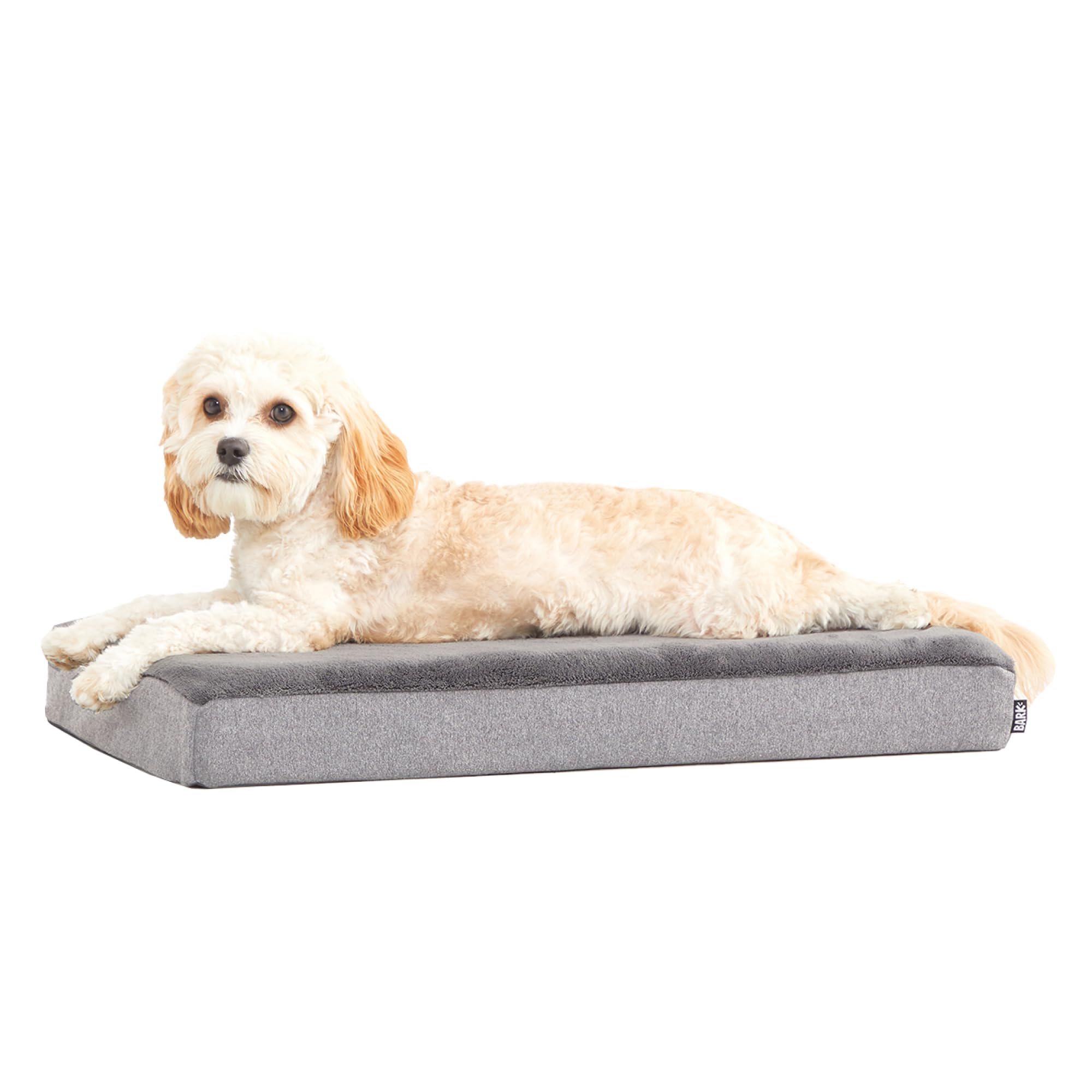 Barkbox Orthopedic Bed memory foam closeup shows joint support for restful sleep.