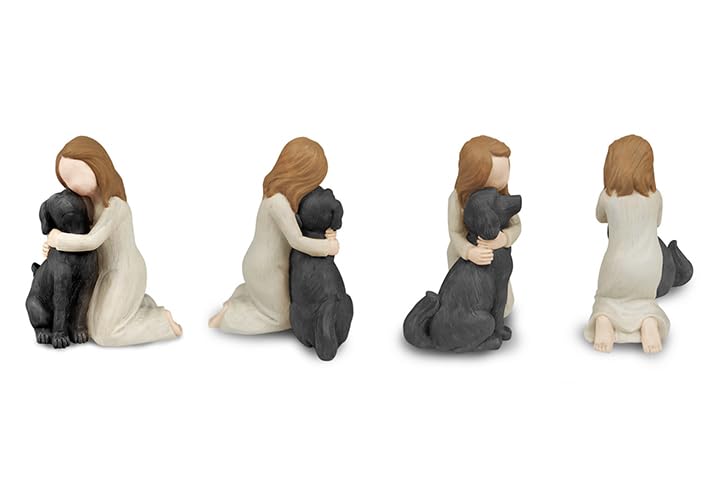 BC Bingo Castle angel hug black dog sculpture highlighting affectionate memorial moment