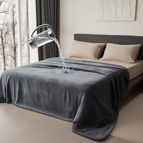 Bedding Aid waterproof blanket on bed and couch protecting surfaces from spills and accidents.