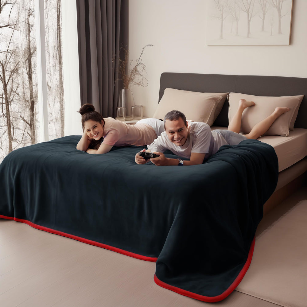 Bedding Aid Midnight Black on couch protects furniture from spills