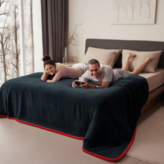 Bedding Aid Midnight Black on couch protects furniture from spills