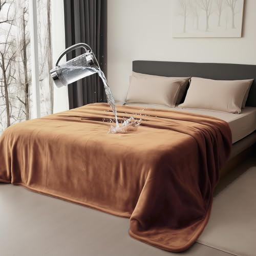 Bedding Aid waterproof throw blanket on bed and couch for versatile protection.