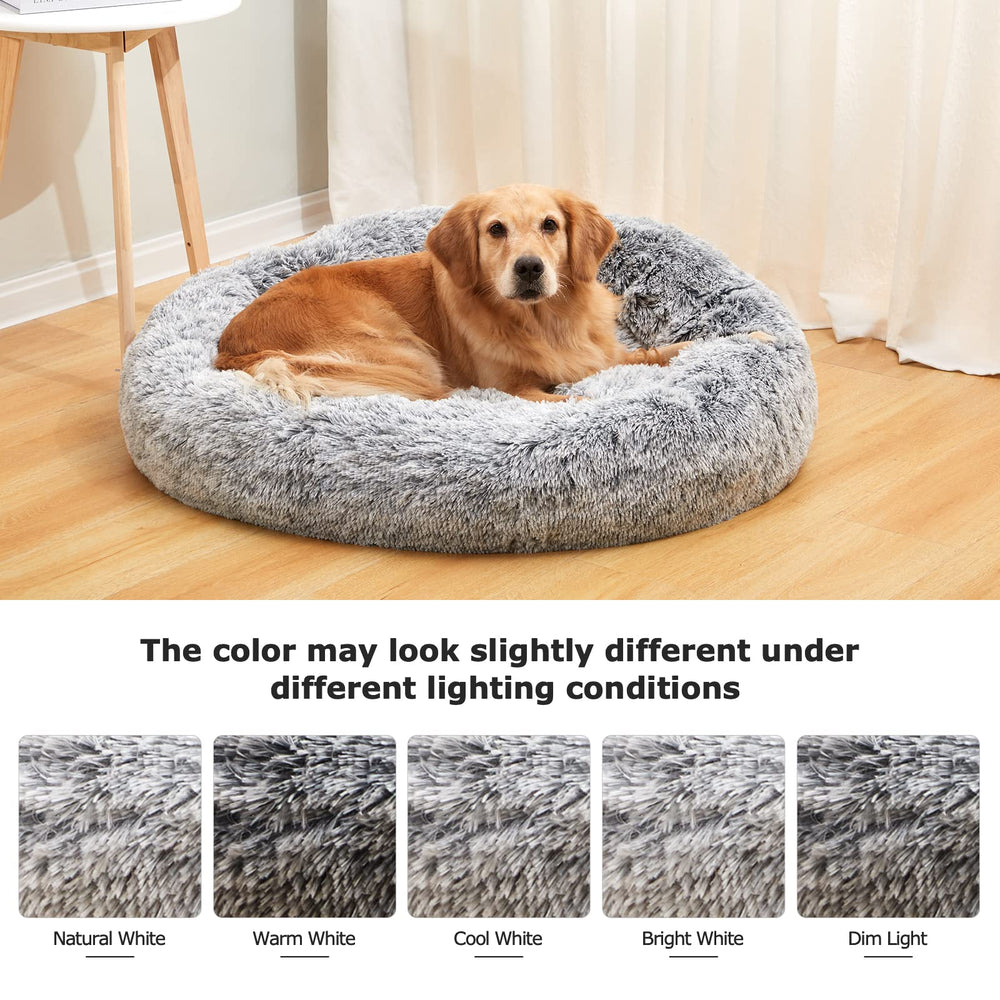Bedfolks Calming Donut Bed in use with dog curling up for comfort