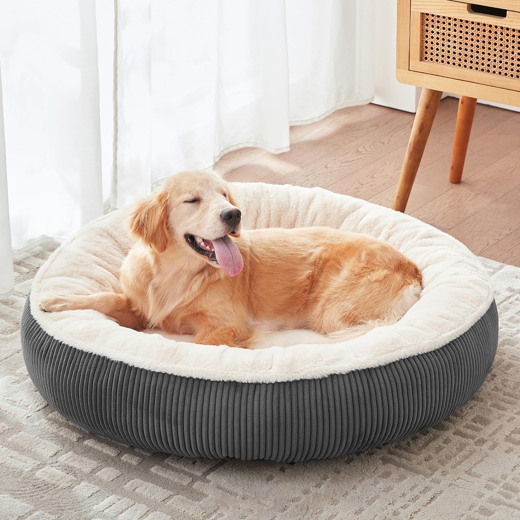 BedStill Donut Dog Bed in dark grey creates cozy resting spot for large dogs up to 80 lbs.