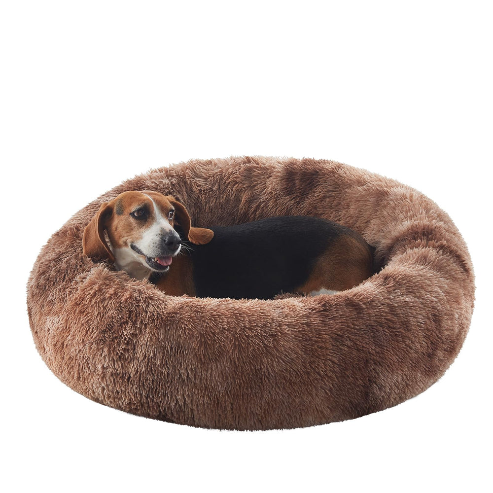 BedStill donut dog bed side view shows tie-dye brown pattern for cozy security during naps