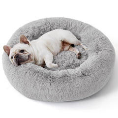 Bedsure calm dog bed round 23inch with plush faux fur for curling sleepers.
