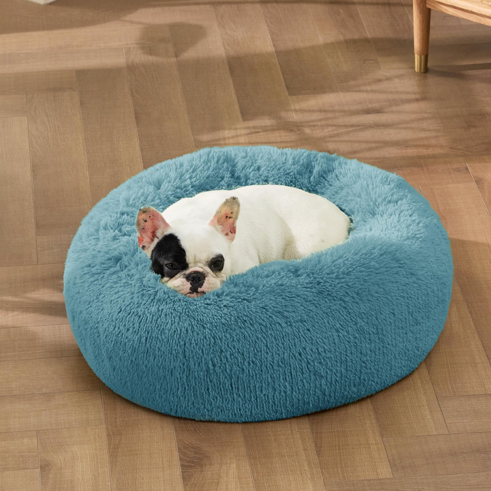 Bedsure calming donut bed anti-slip base keeps bed in place.
