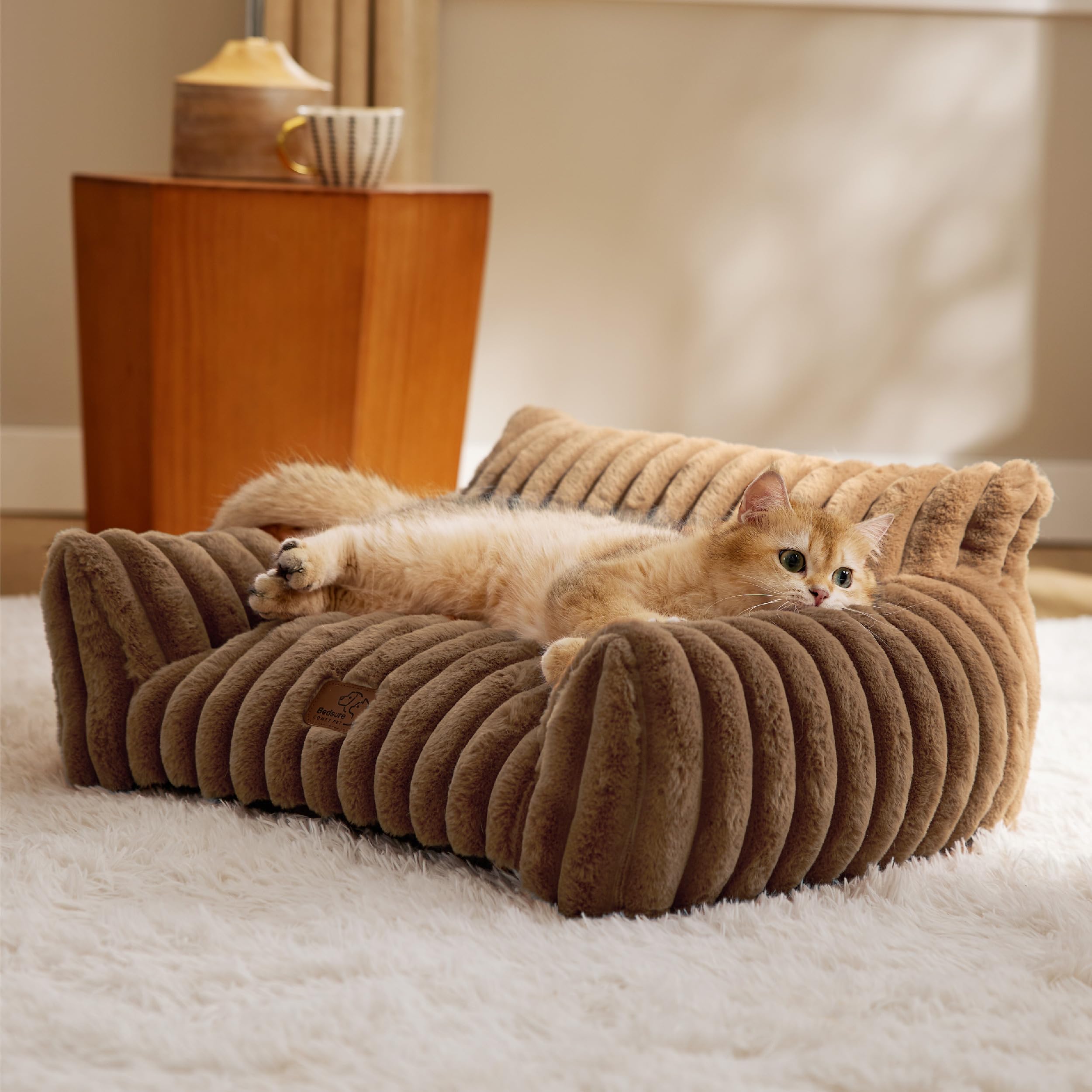 Bedsure Cute Cat Couch 24inch copper brown in use for compact indoor lounging by a cat
