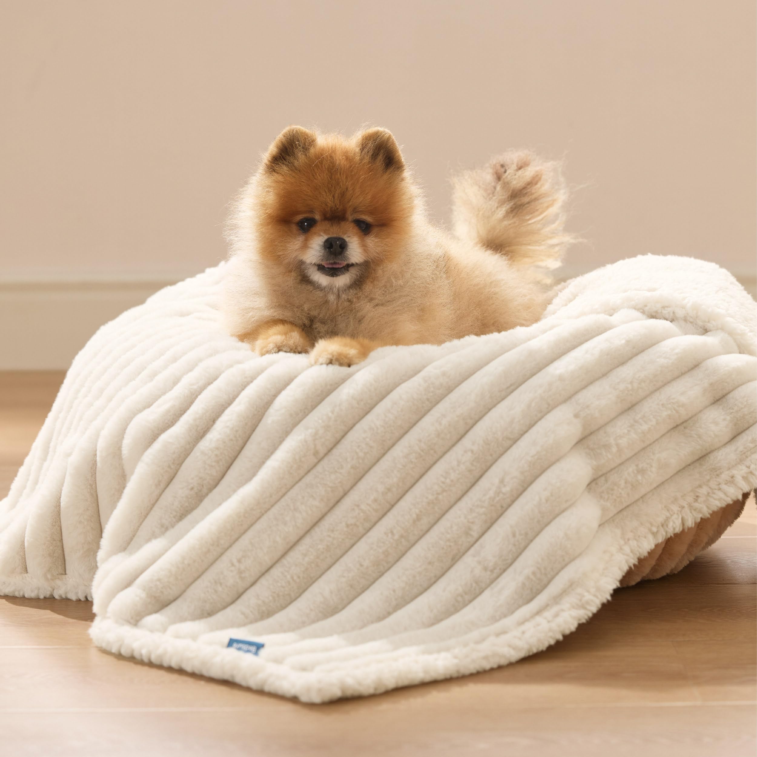 Bedsure cream texture closeup highlights plush sherpa comfort.