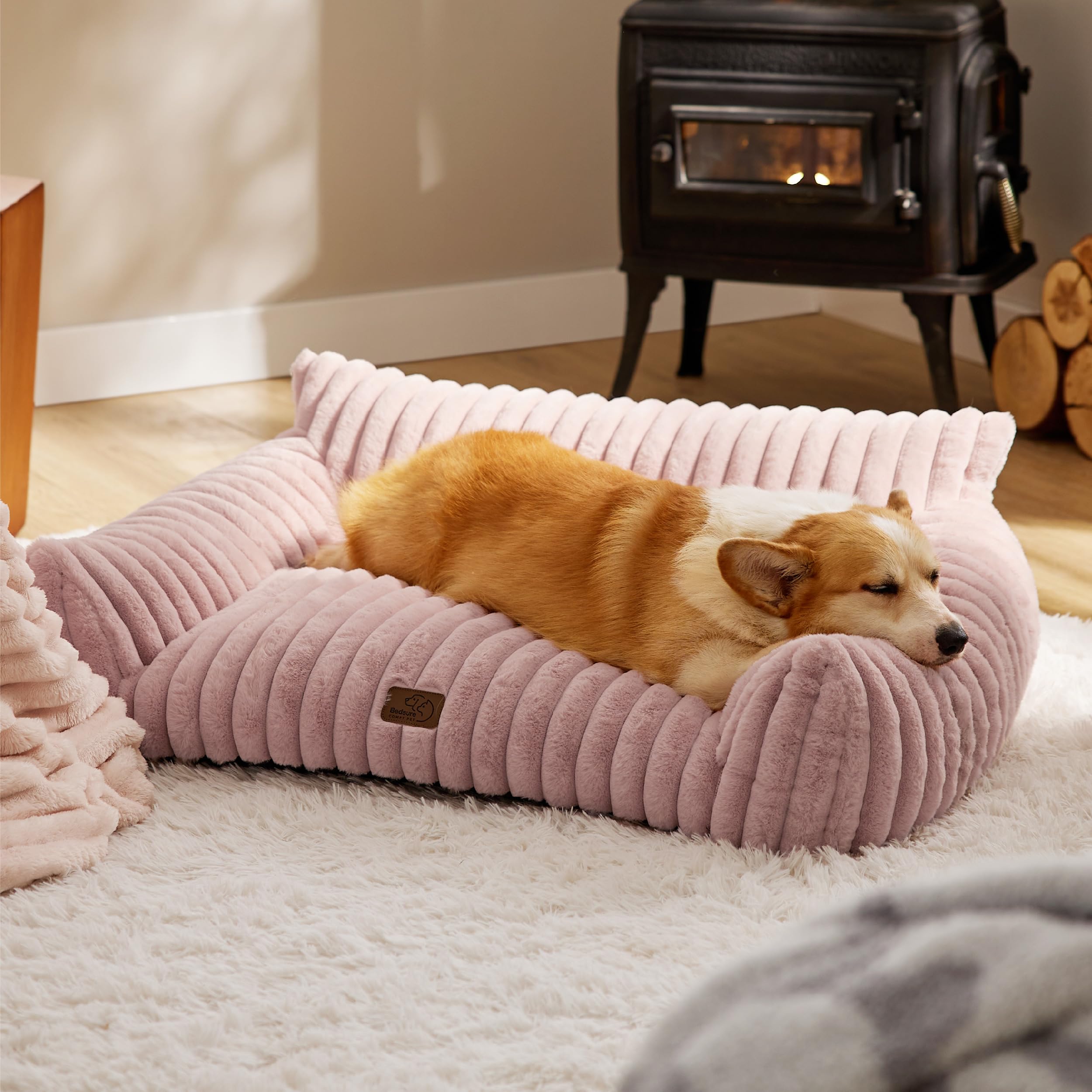 Bedsure dog couch blush room scene demonstrates coordinated cozy pet-friendly decor.