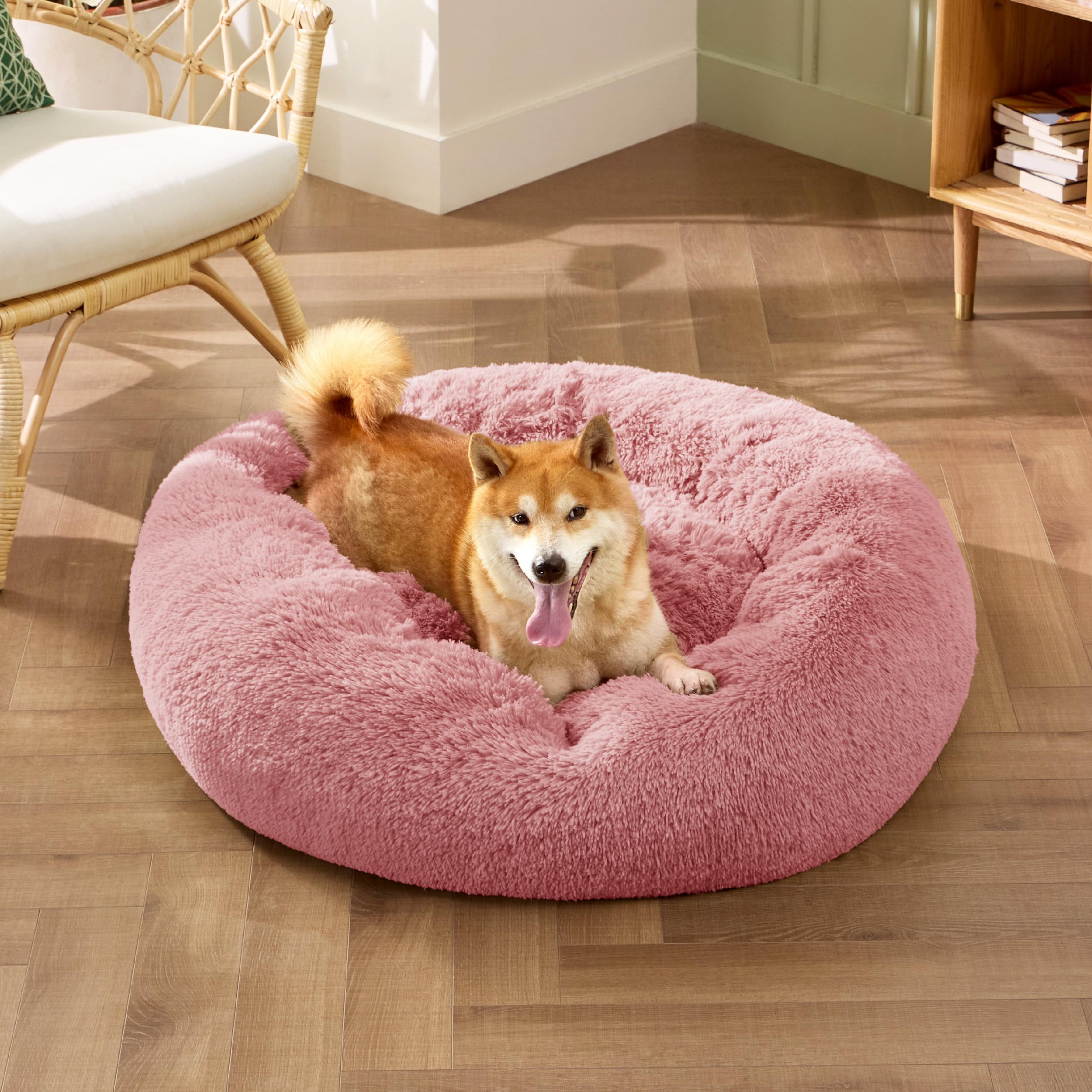 Bedsure donut bed non-slip base keeps pet resting securely on any floor.