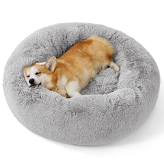 Bedsure donut dog bed, round 30-inch design, provides a calming curl-up nap space.