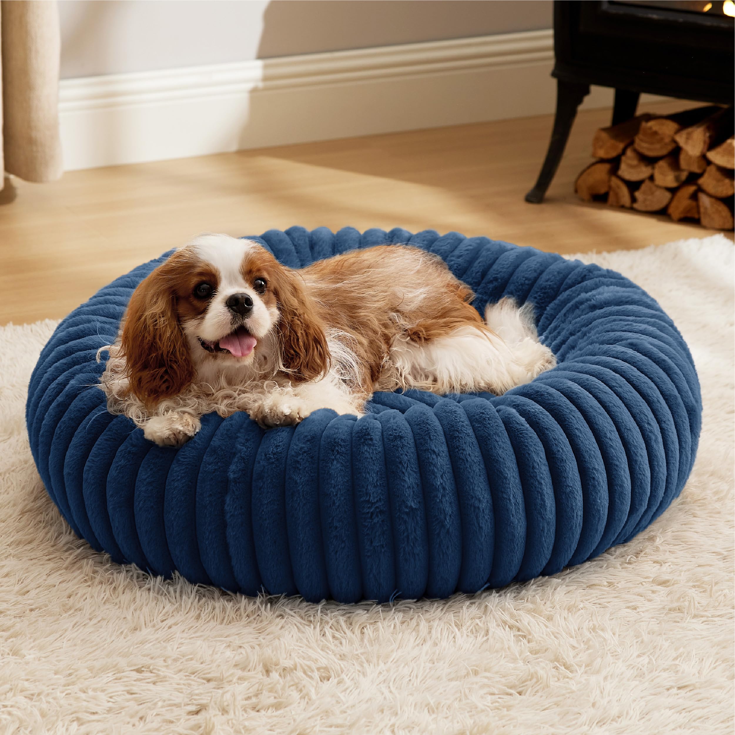 Bedsure donut small dog bed night blue image highlights cozy decor and lounging.