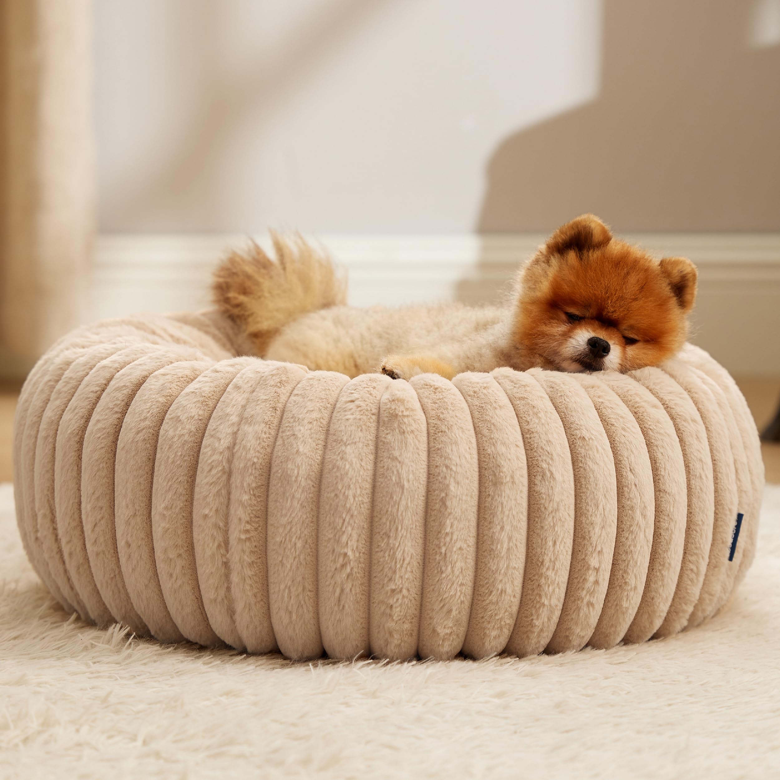 Bedsure Donut Small Dog Bed rubberized dots base adds stability.