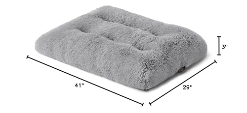 Bedsure grey faux fur dog bed blends with home decor while supporting restful sleep.