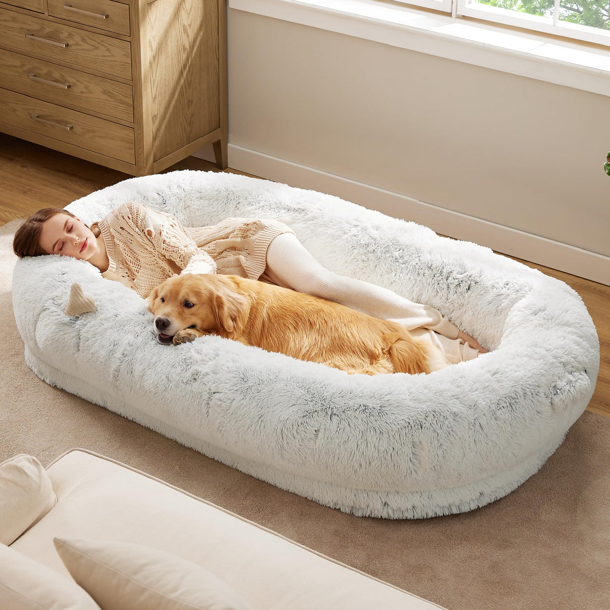 Bedsure human dog bed with cushioned bolster for head and neck support.