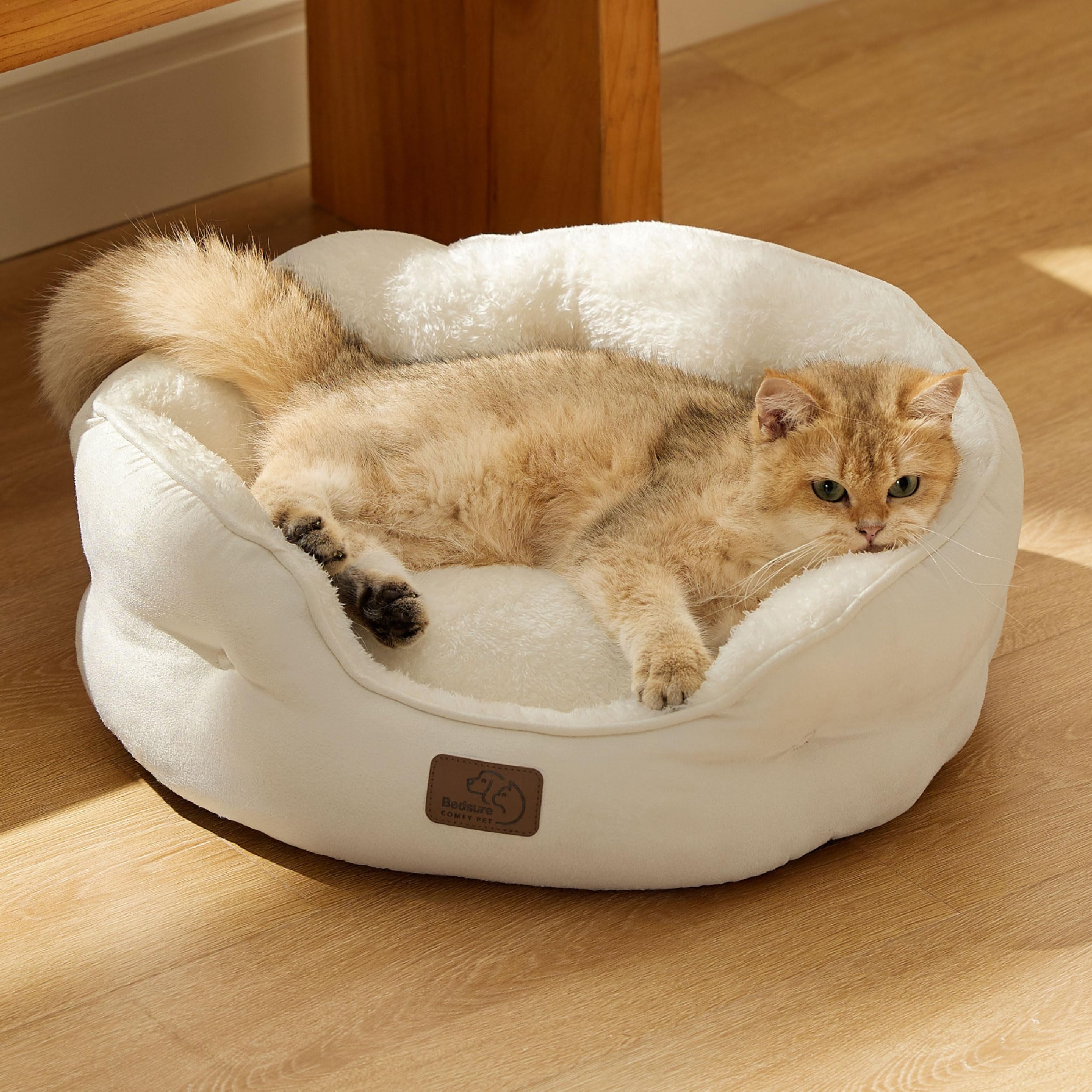 Bedsure round bed suits small dogs and indoor cats for cozy nesting.