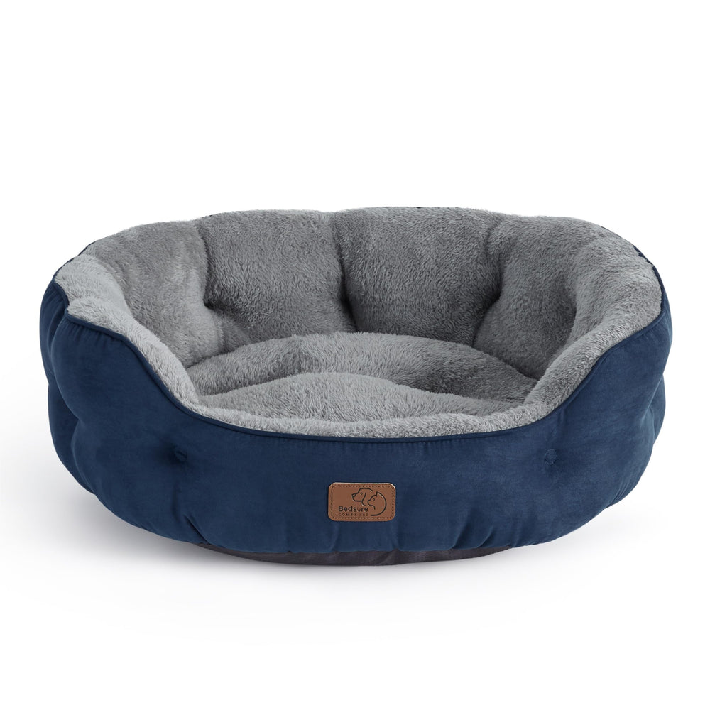 Bedsure round dog bed navy with plush sherpa surface for cozy lounging.